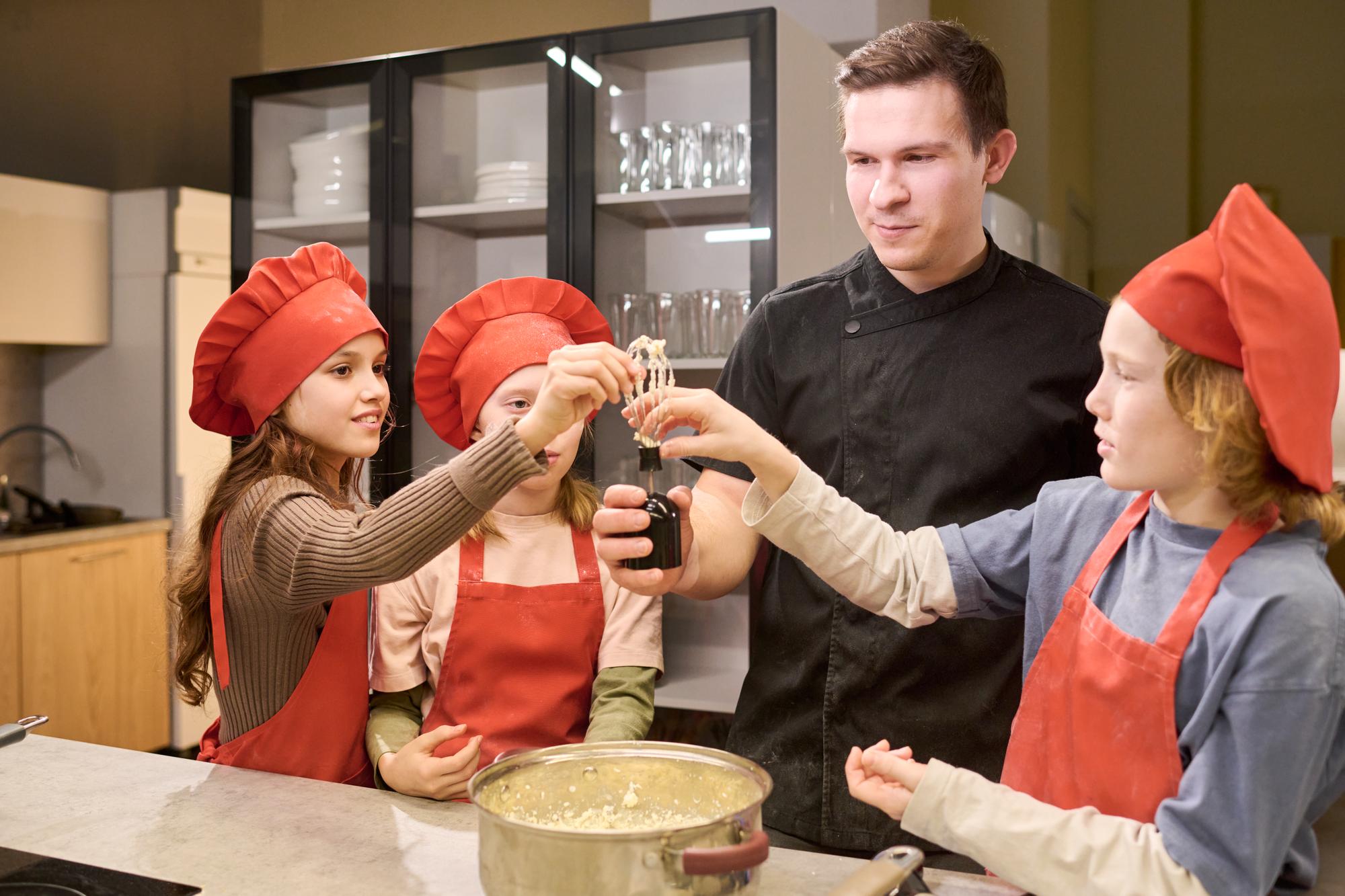 Chef demonstrating sauce technique